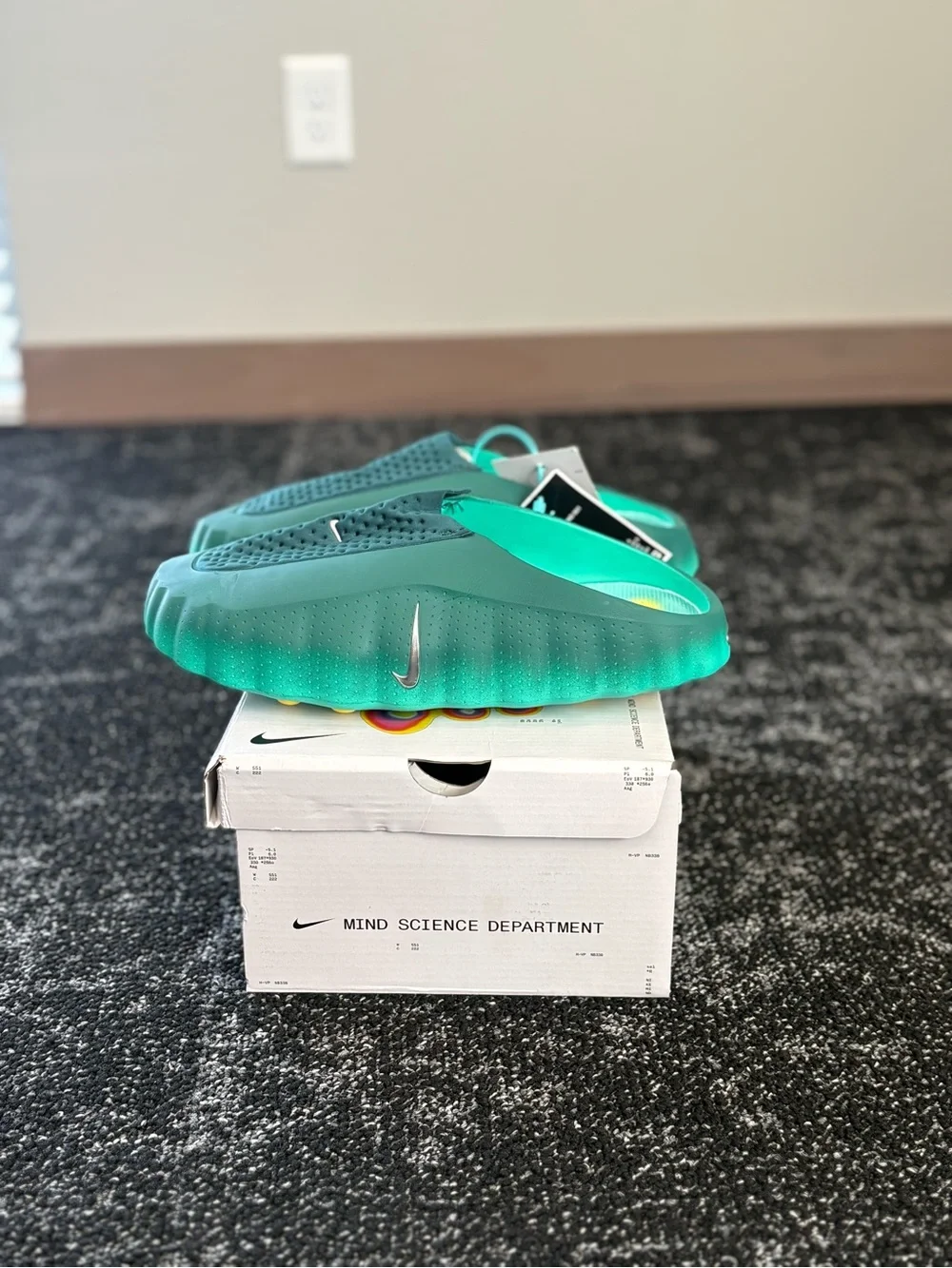 Nike Teal Green Slide Sandals with Silver Swoosh